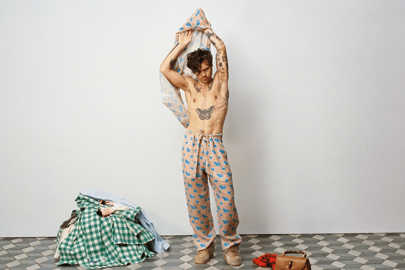 Gucci Criticized For Pics Of Harry Styles Posing With Mattress